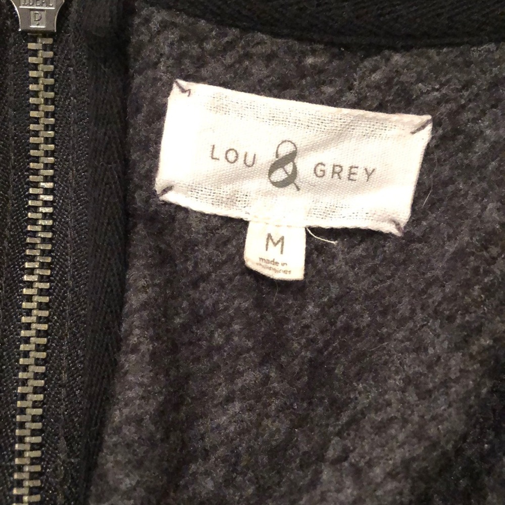 Grey sweater dress with zipper in the back.